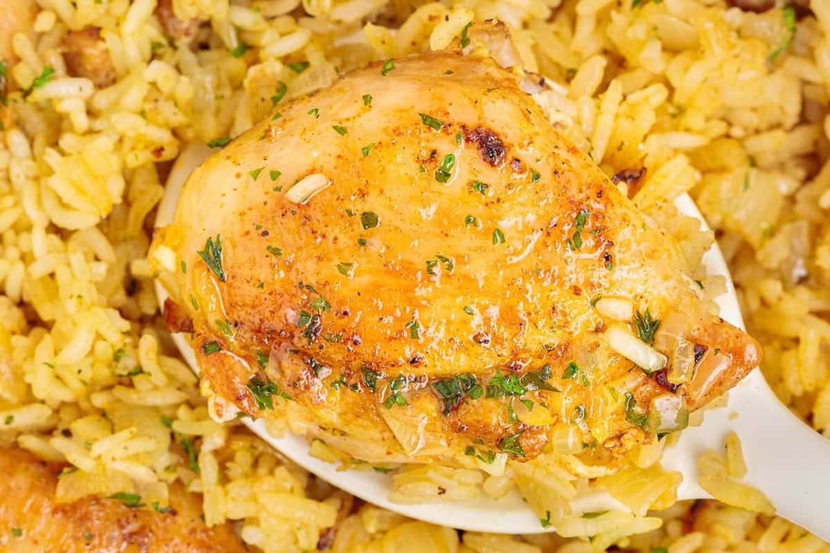 A dish of Chicken Thighs and Rice.