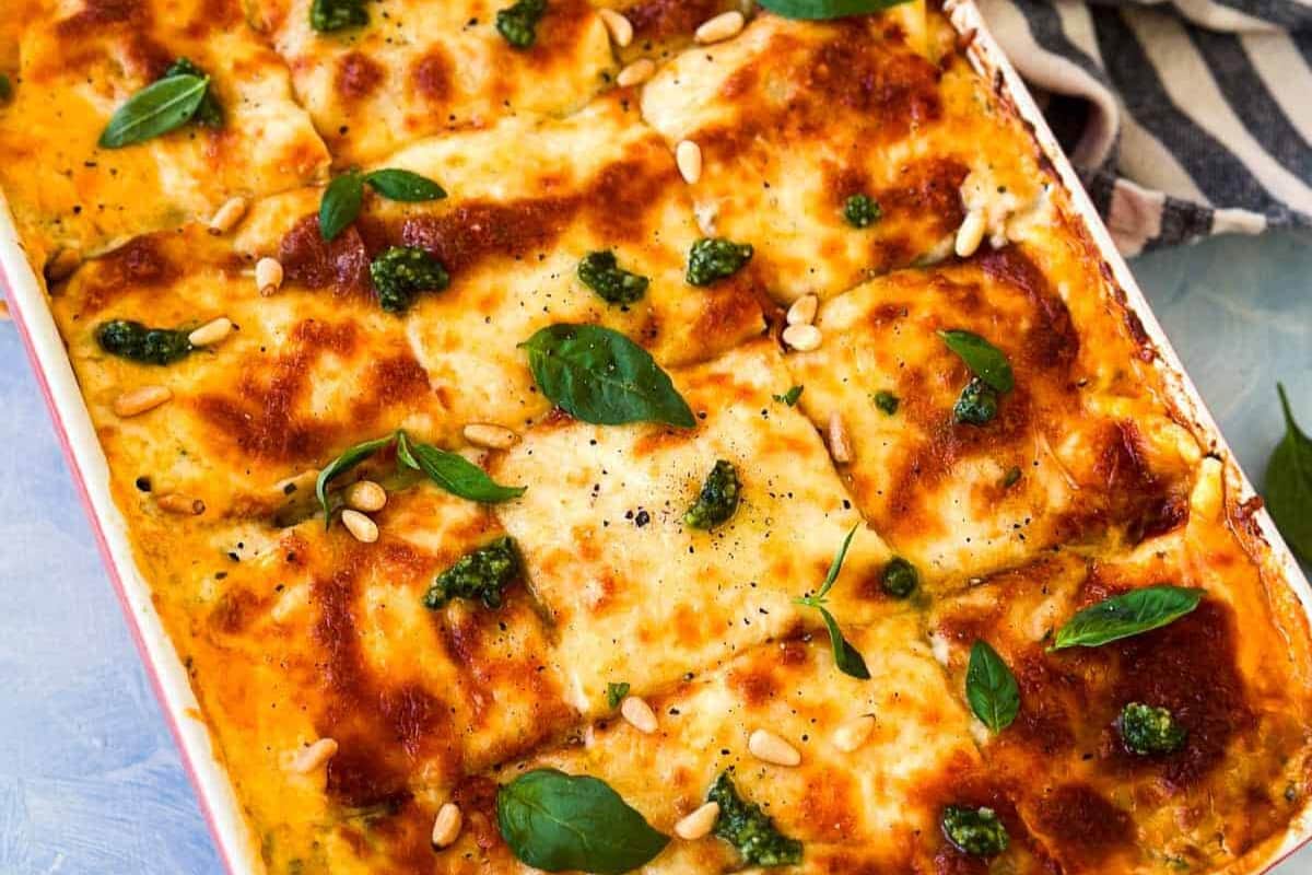 A dish of Creamy Pesto Chicken and Zucchini Lasagna.