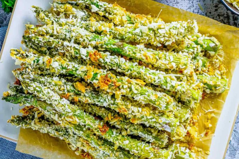 A plate of Crispy Baked Parmesan Asparagus Fries.