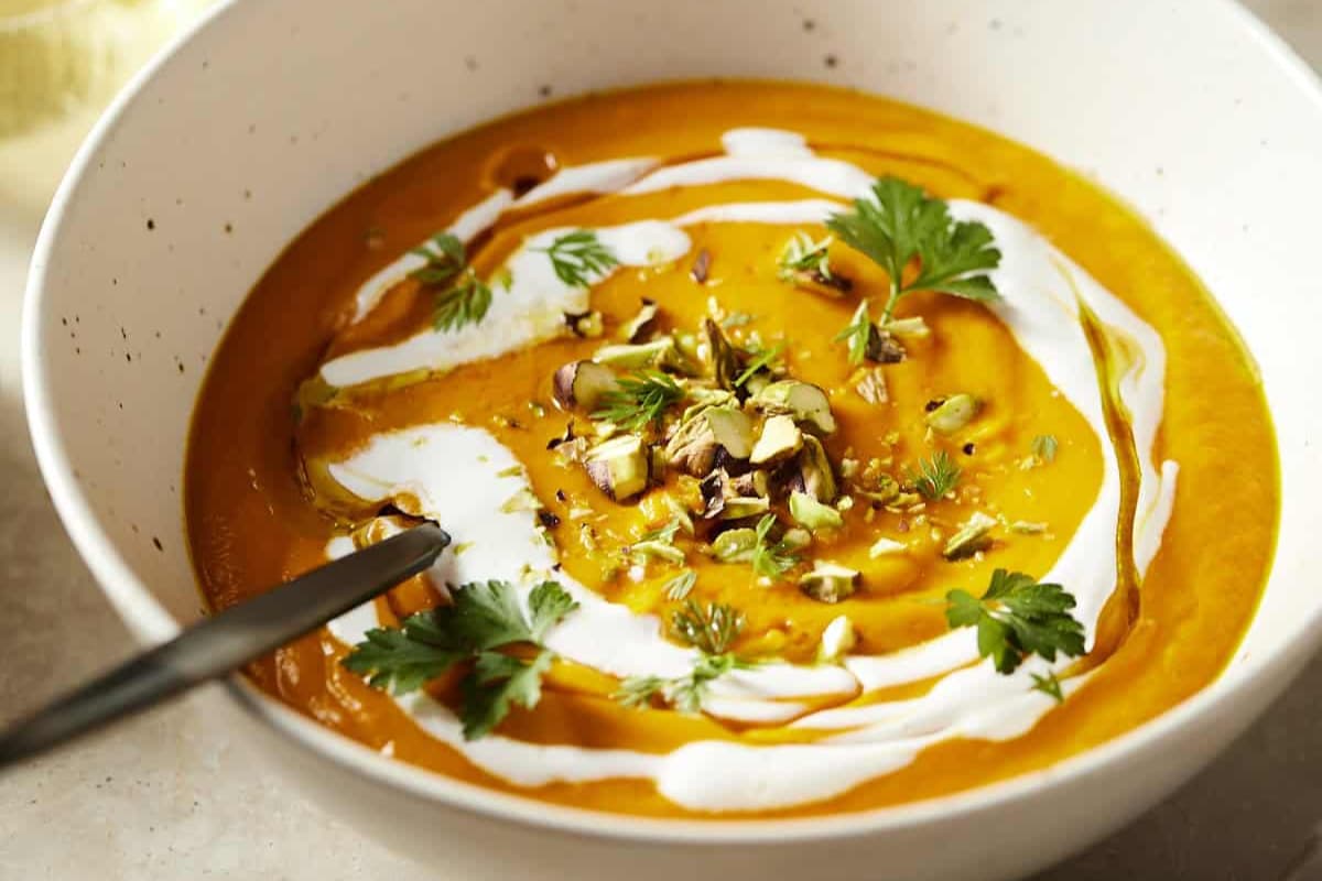 A bowl of Curried Carrot Ginger Soup.
