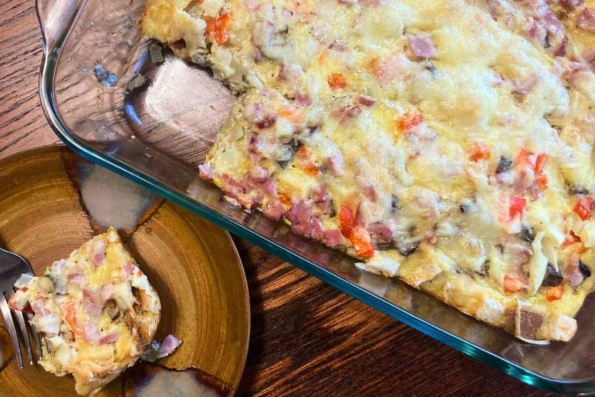 A dish of Ham and Cheese Sourdough Breakfast Casserole.