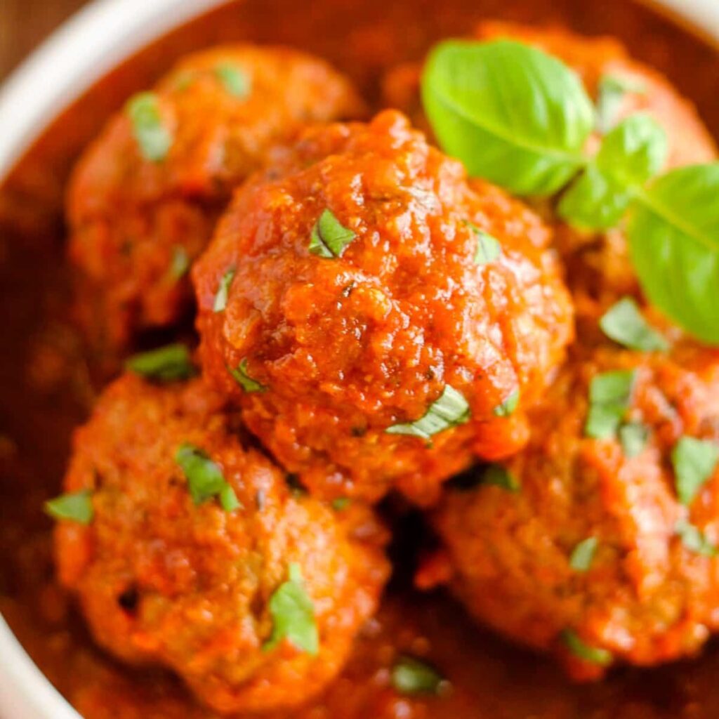 A bowl of Nyuszi's homemade meatballs and sauce.