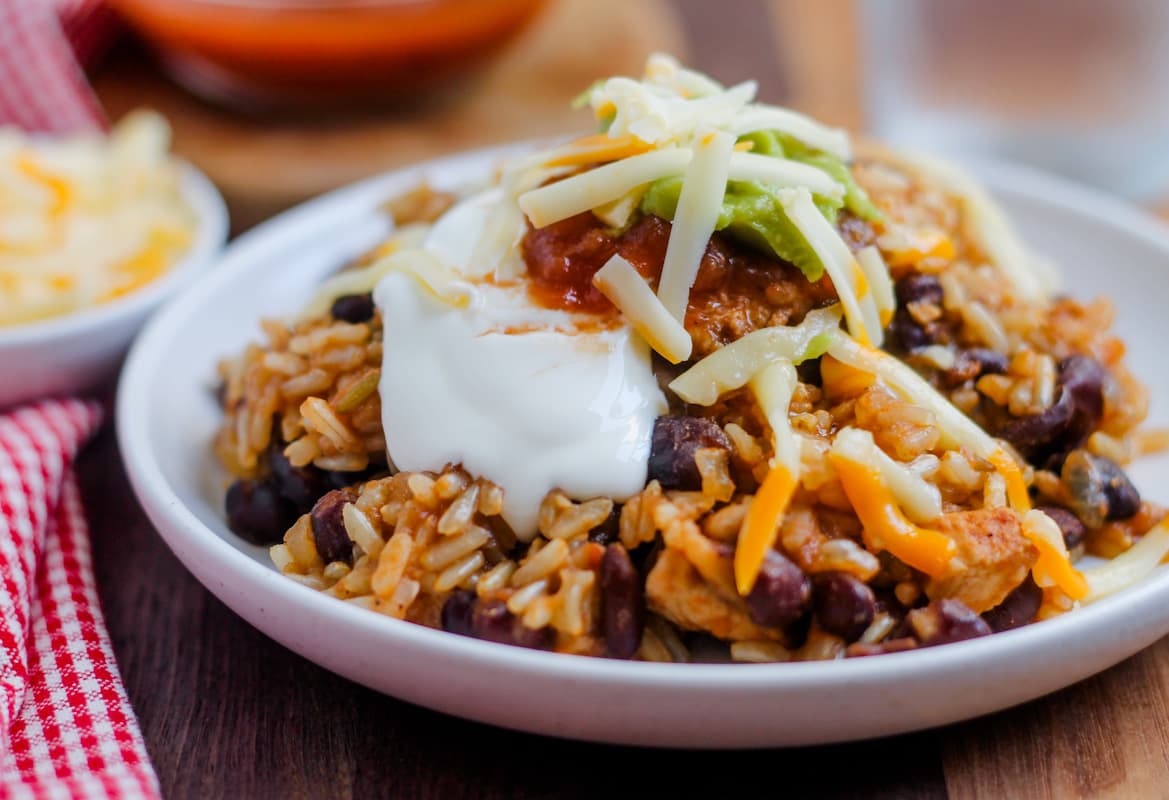 A plate of instant pot chicken and rice bowls.