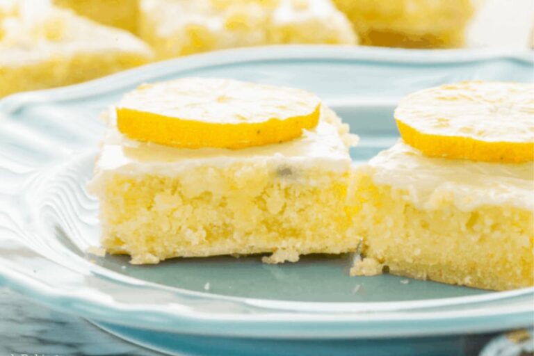 A plate of Lemon Brownies with Lemon Glaze.