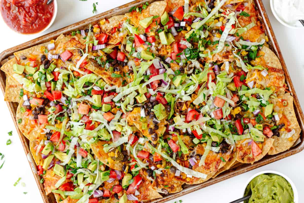 A tray of loaded veggie nachos.