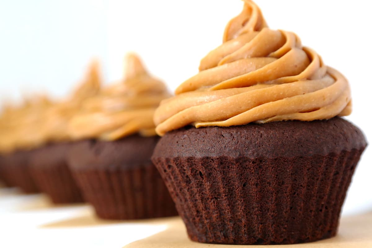 A plate of Peanut Butter Chocolate Protein Cupcakes.