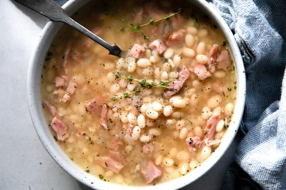 A bowl of Navy Bean Soup with Ham.