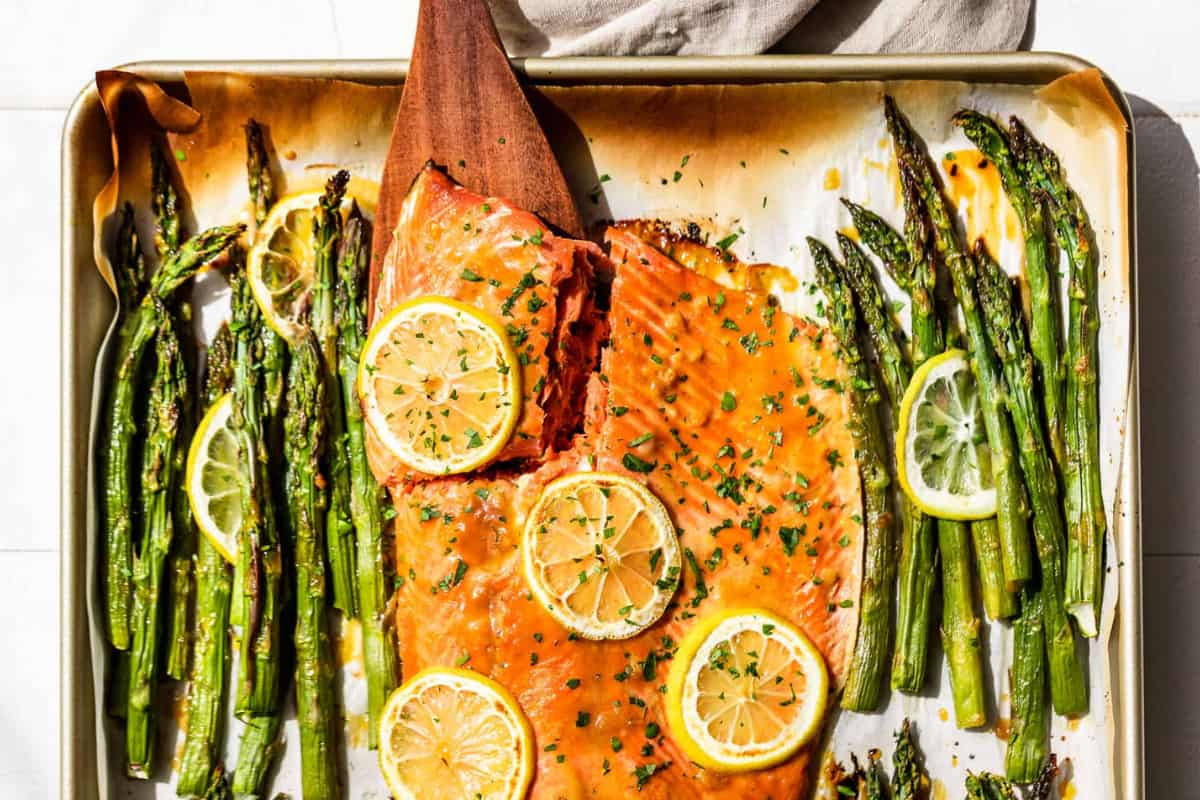 A pan of Sheet Pan Salmon and Asparagus.