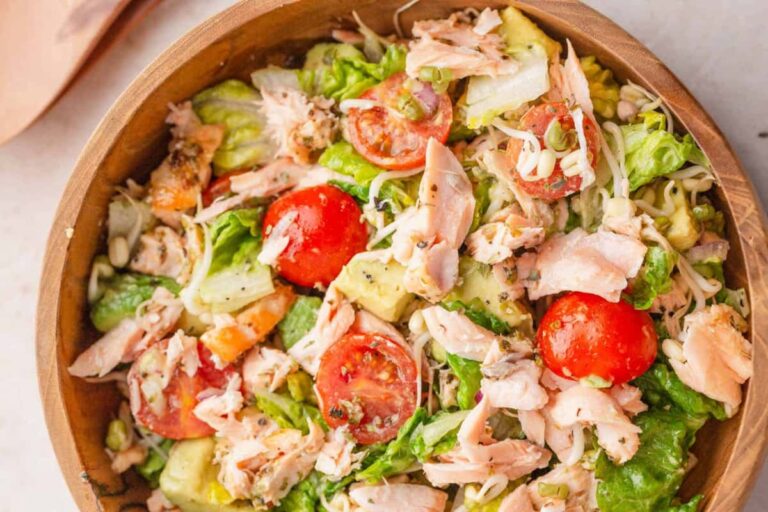 A bowl of Mediterranean Salmon Avocado Salad.