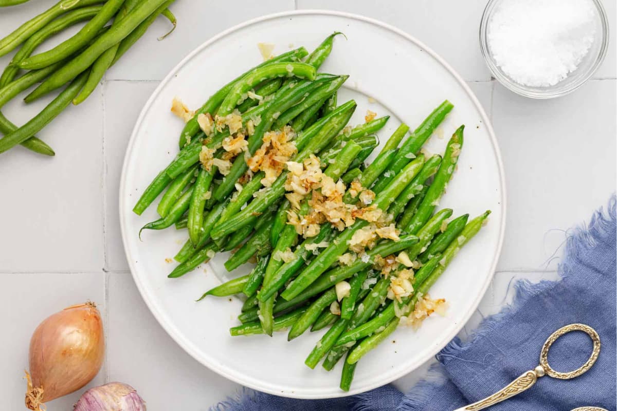 A plate of Sautéed Green Beans with Shallots.