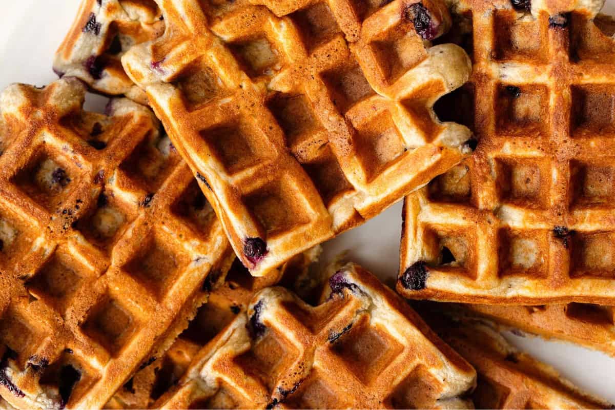 A plate of blueberry banana waffles.