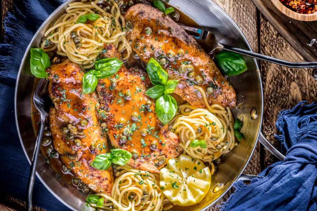 A pan of Chicken Piccata with Caper Lemon Butter Sauce.