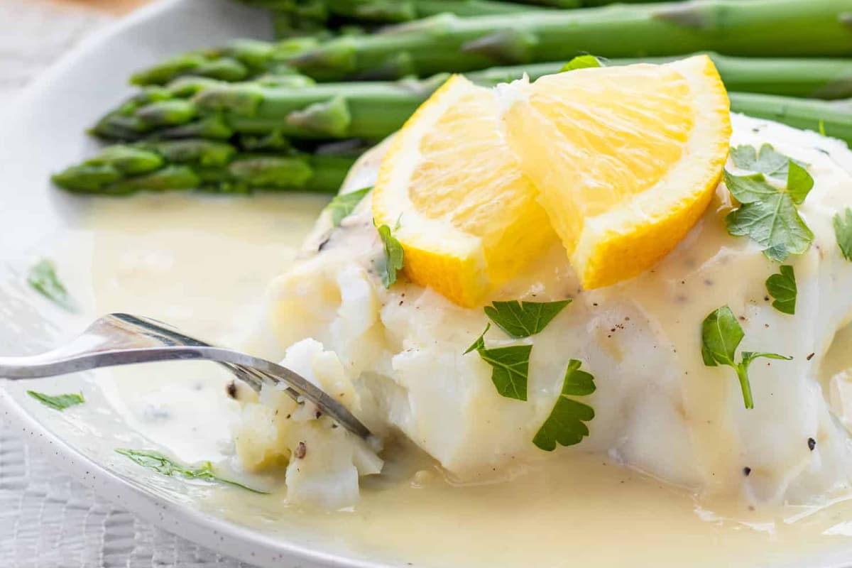 A plate of White Fish with Healthy Lemon Garlic Sauce.