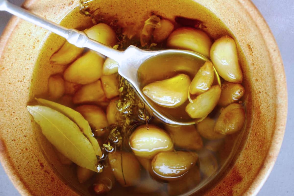A bowl of Oven Roasted Garlic Confit.