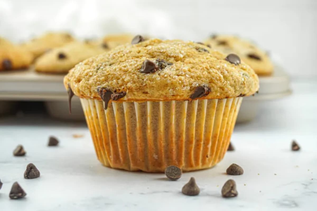 A plate of Healthier Bakery Style Chocolate Chip Muffins.