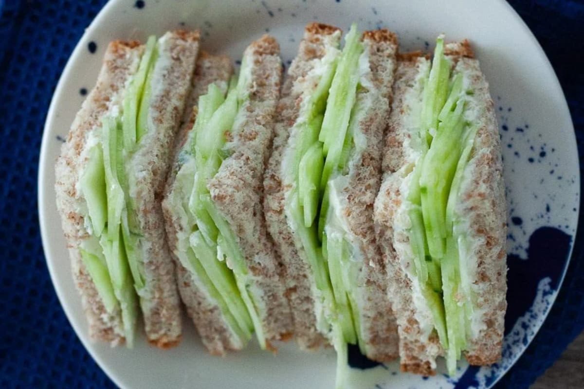 A plate of Cream Cheese Cucumber Sandwiches with Jalapeno.