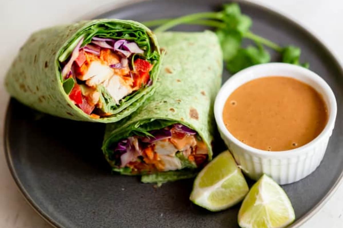 A plate of Peanut Chicken Wraps.