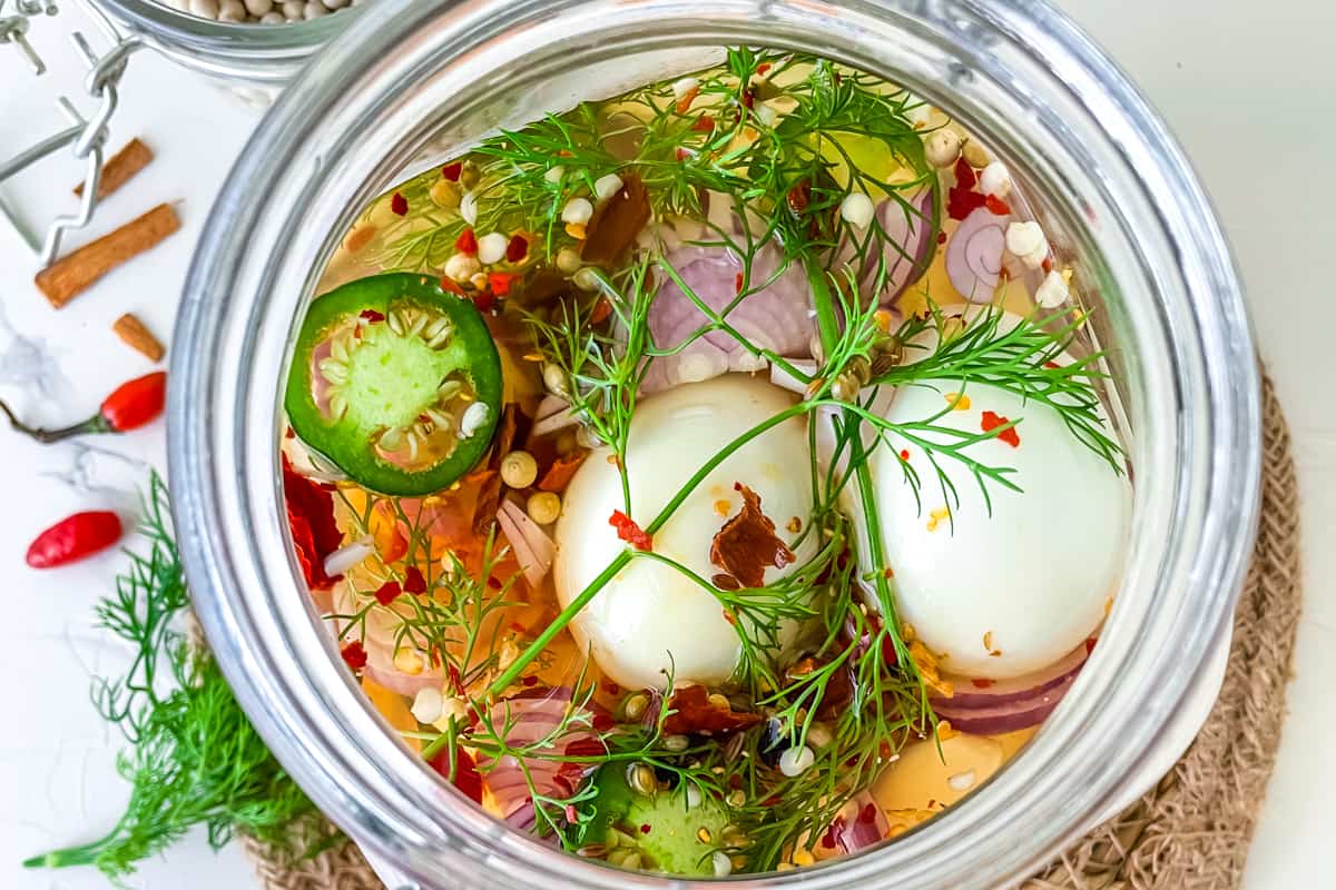 A jar of Spicy Jalapeno Pickled Eggs.