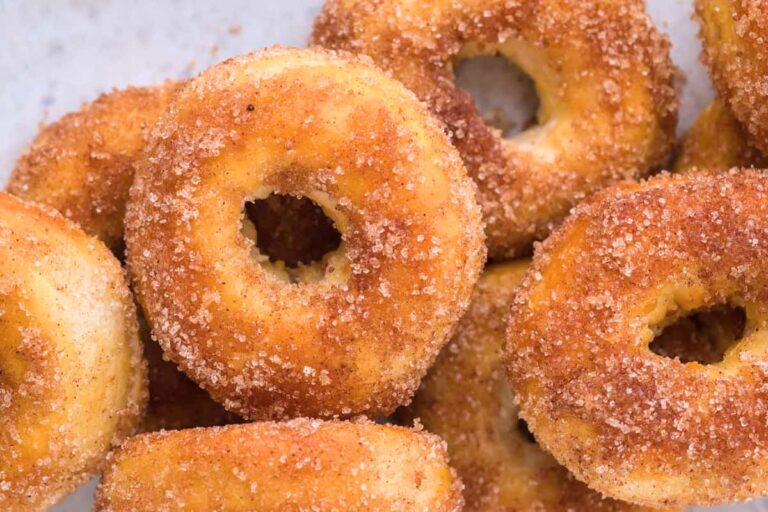 A plate of air fryer cinnamon donuts.