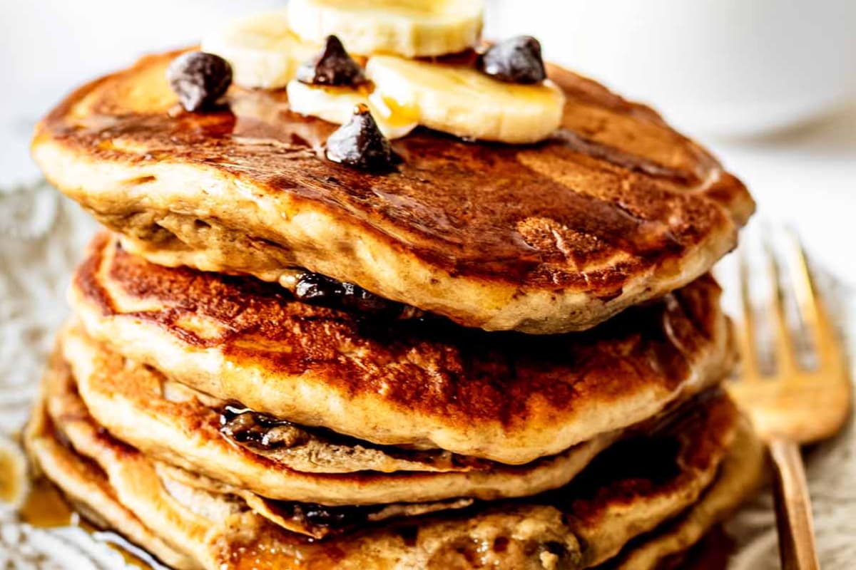 A plate of Banana Chocolate Chip Pancakes.