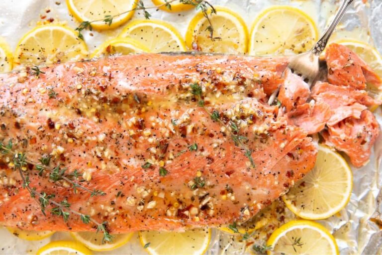 A plate of Baked Salmon with Lemon Butter.