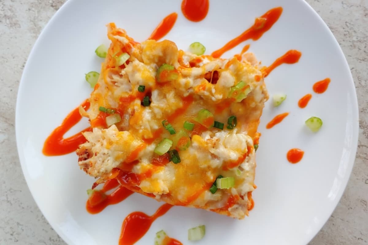 A plate of Buffalo Chicken Enchilada Casserole.