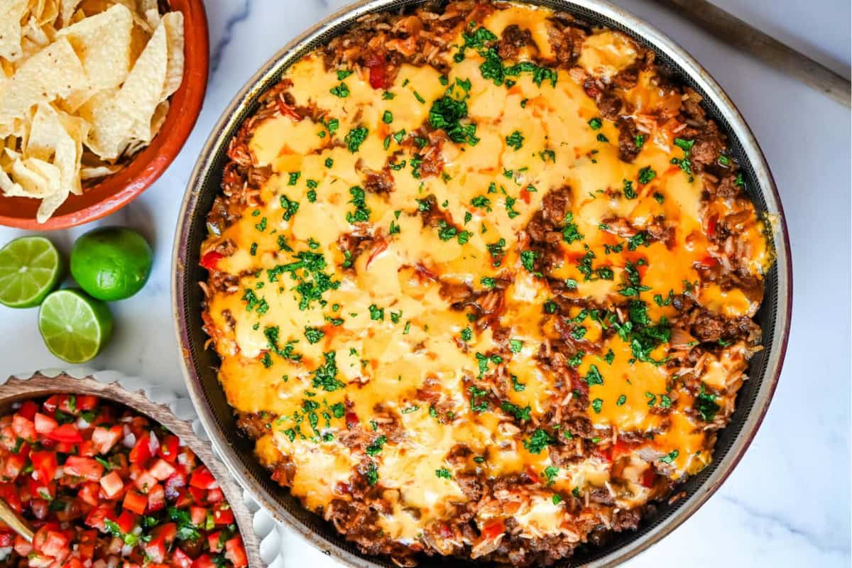 A dish of Cheesy Taco Beef and Rice Skillet.