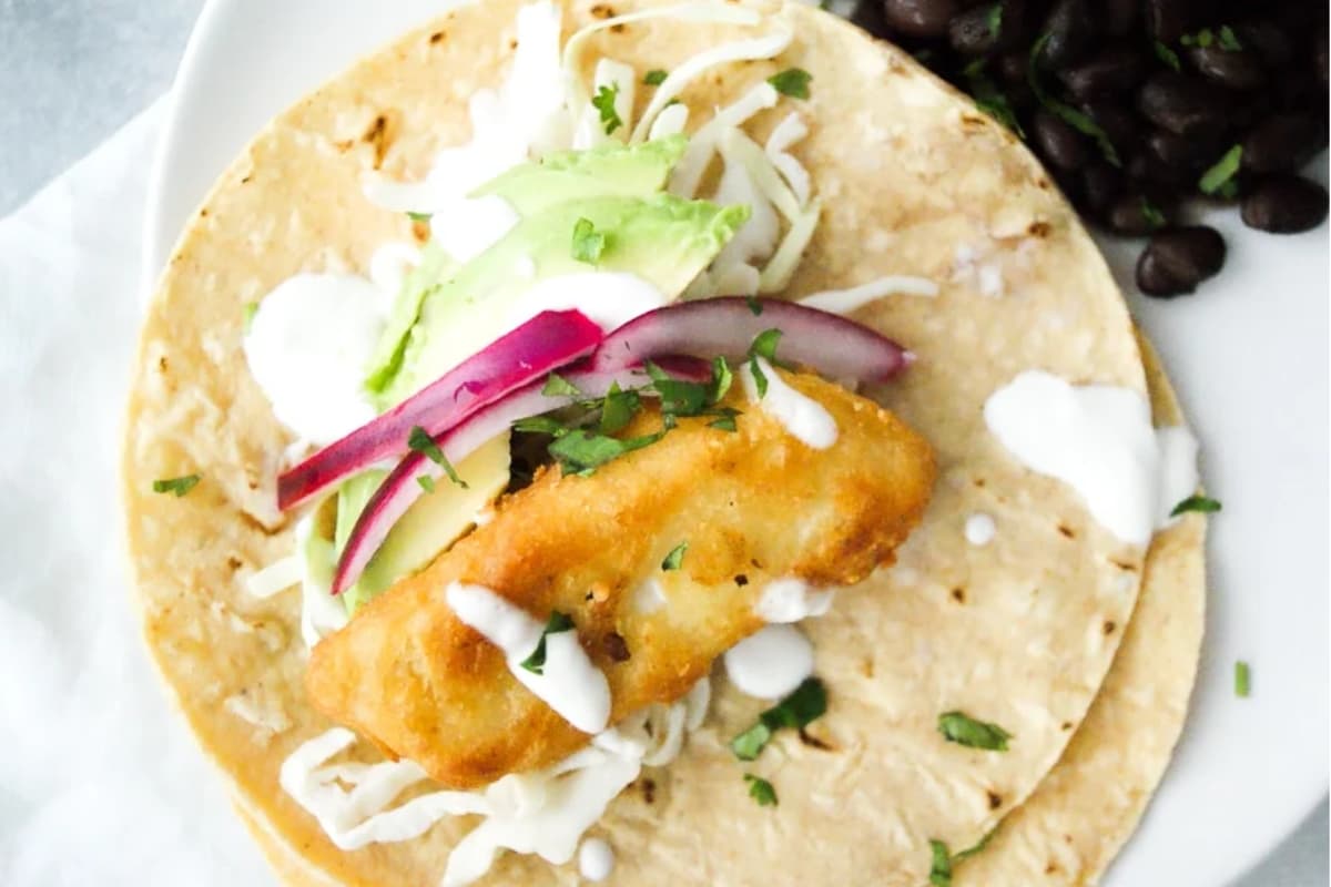 A plate of Easy Fish Tacos with Fish Sticks.