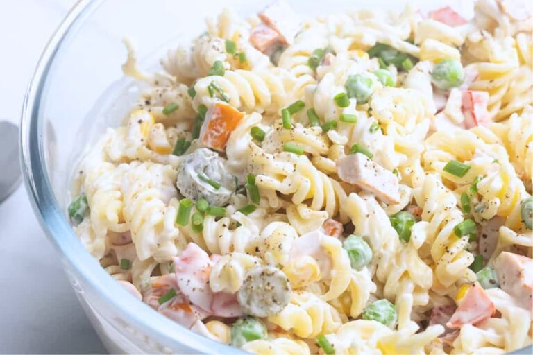A bowl of German Pasta Salad (Nudelsalat).