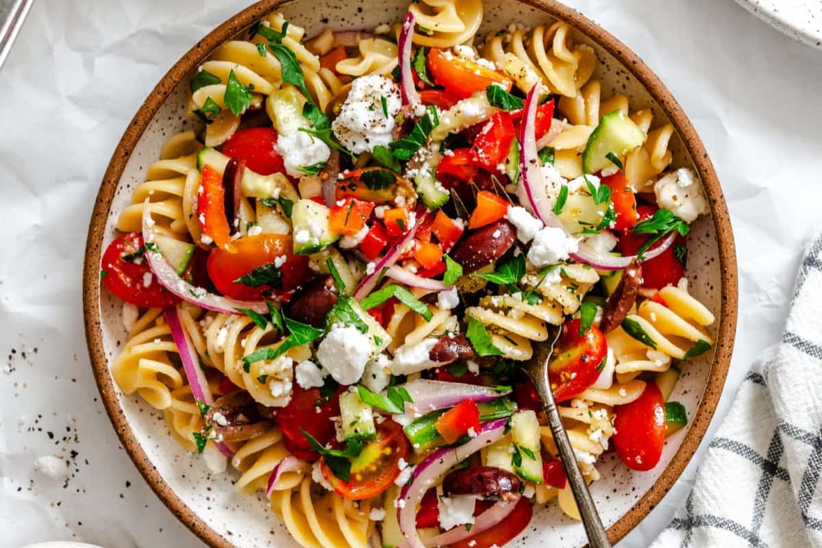 A bowl of Greek Pasta Salad.