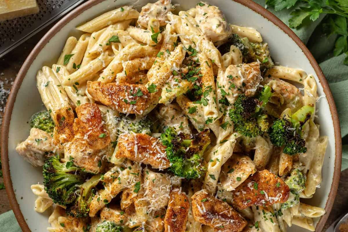 A dish of One Pot Cajun Chicken and Broccoli Alfredo.