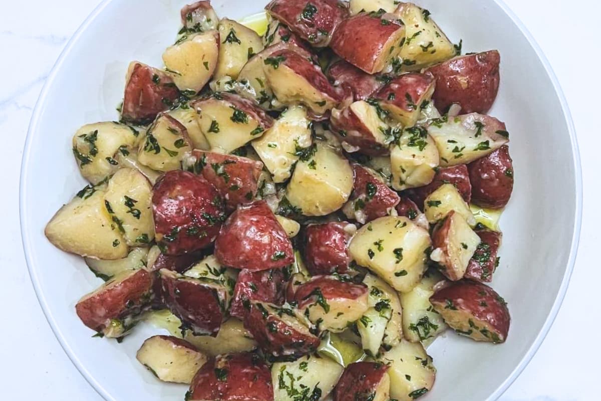 A plate of Parsley Buttered Potatoes.