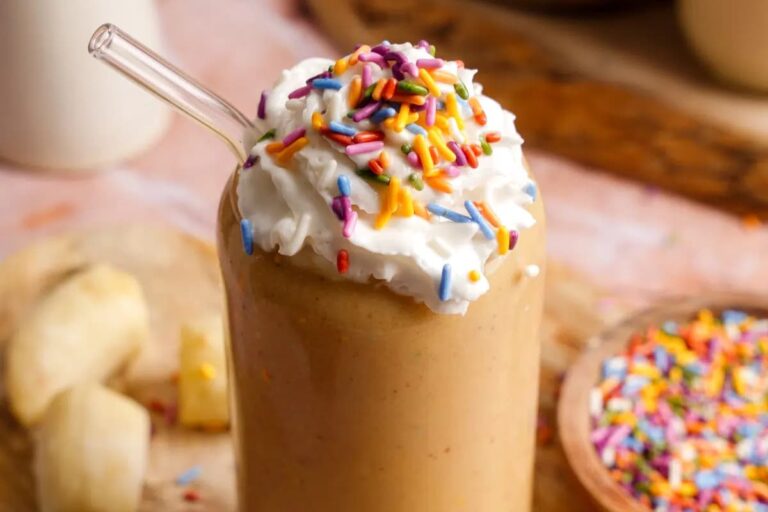 A glass of High-Protein Birthday Cake Smoothie.