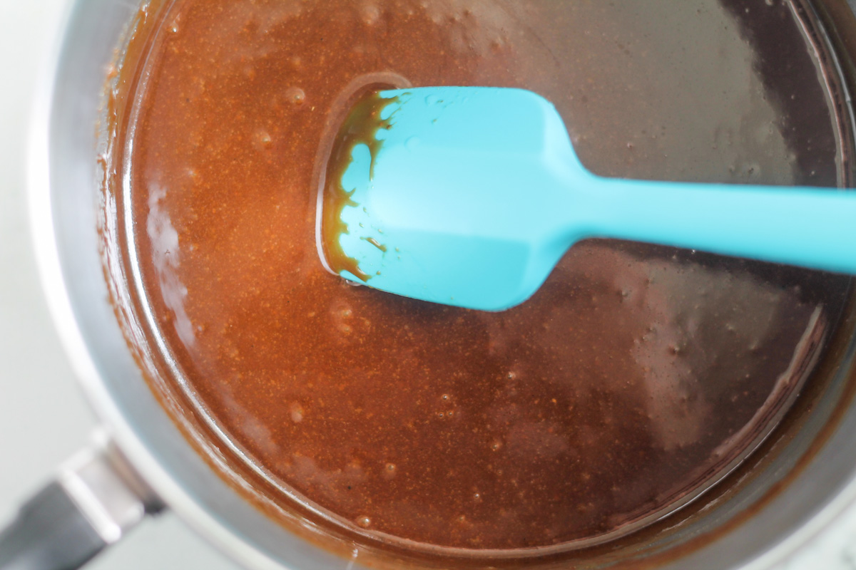 Ingredients being stirred in a pot.