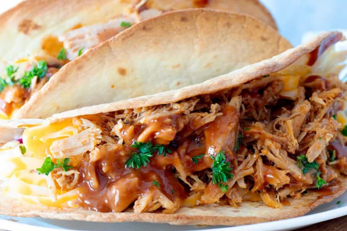 A plate of Pulled Pork Tacos.