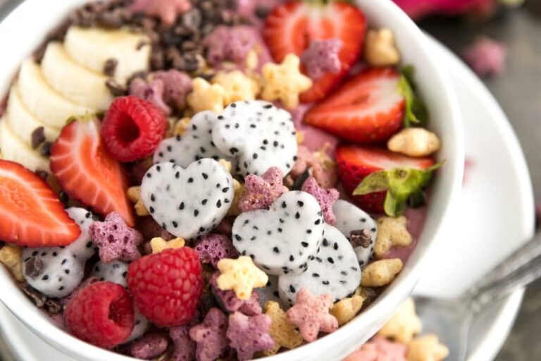 A bowl of Raspberry Beet and Cereal Smoothie Bowl.