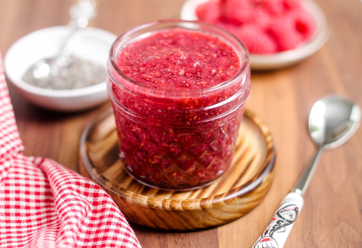 A jar of raspberry chia seed jam.