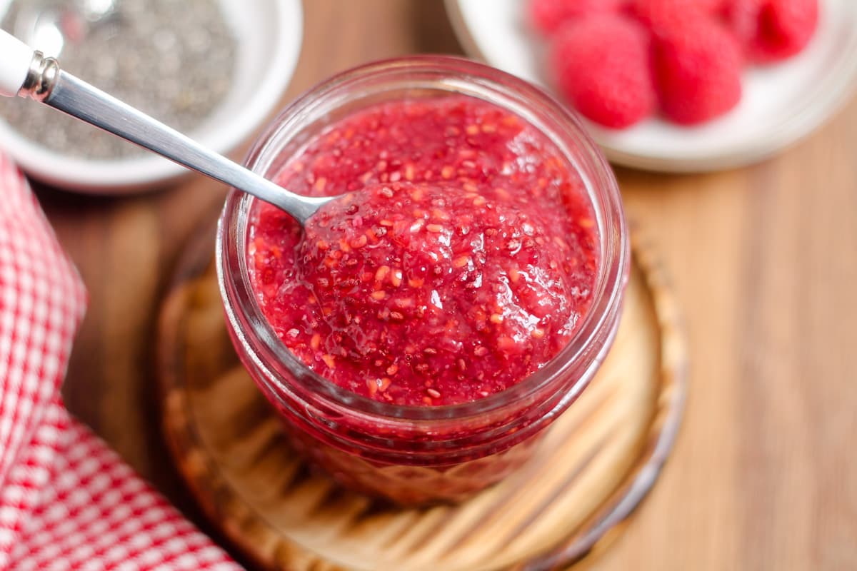 A jar of raspberry chia seed jam.
