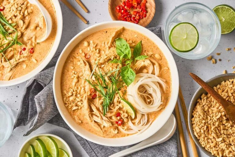 A bowl of Red Curry Chicken Noodle Soup.