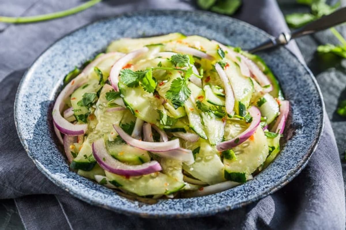 A plate of Asian Sweet and Sour Cucumber Salad.