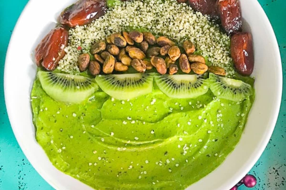 Overhead image of a Turmeric Smoothie Bowl With Kale.