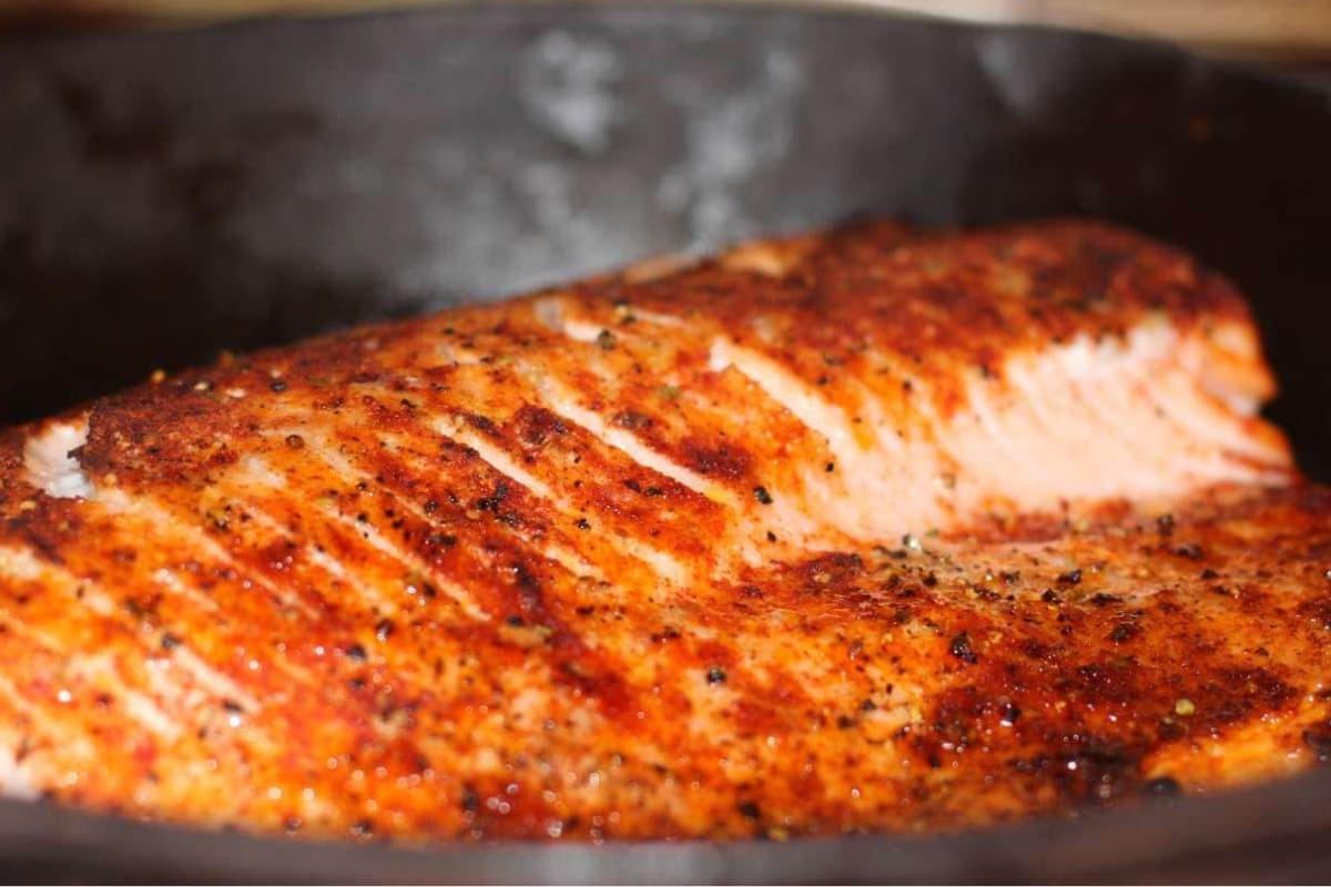 A plate of Broiled Salmon.