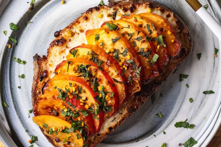 A plate of Air Fryer Peach Cottage Cheese Toast.