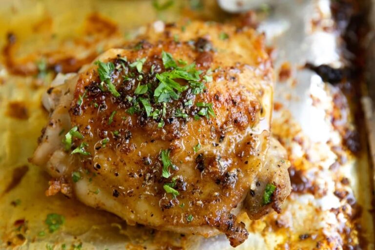 A tray of Baked Bone-In Chicken Thighs.