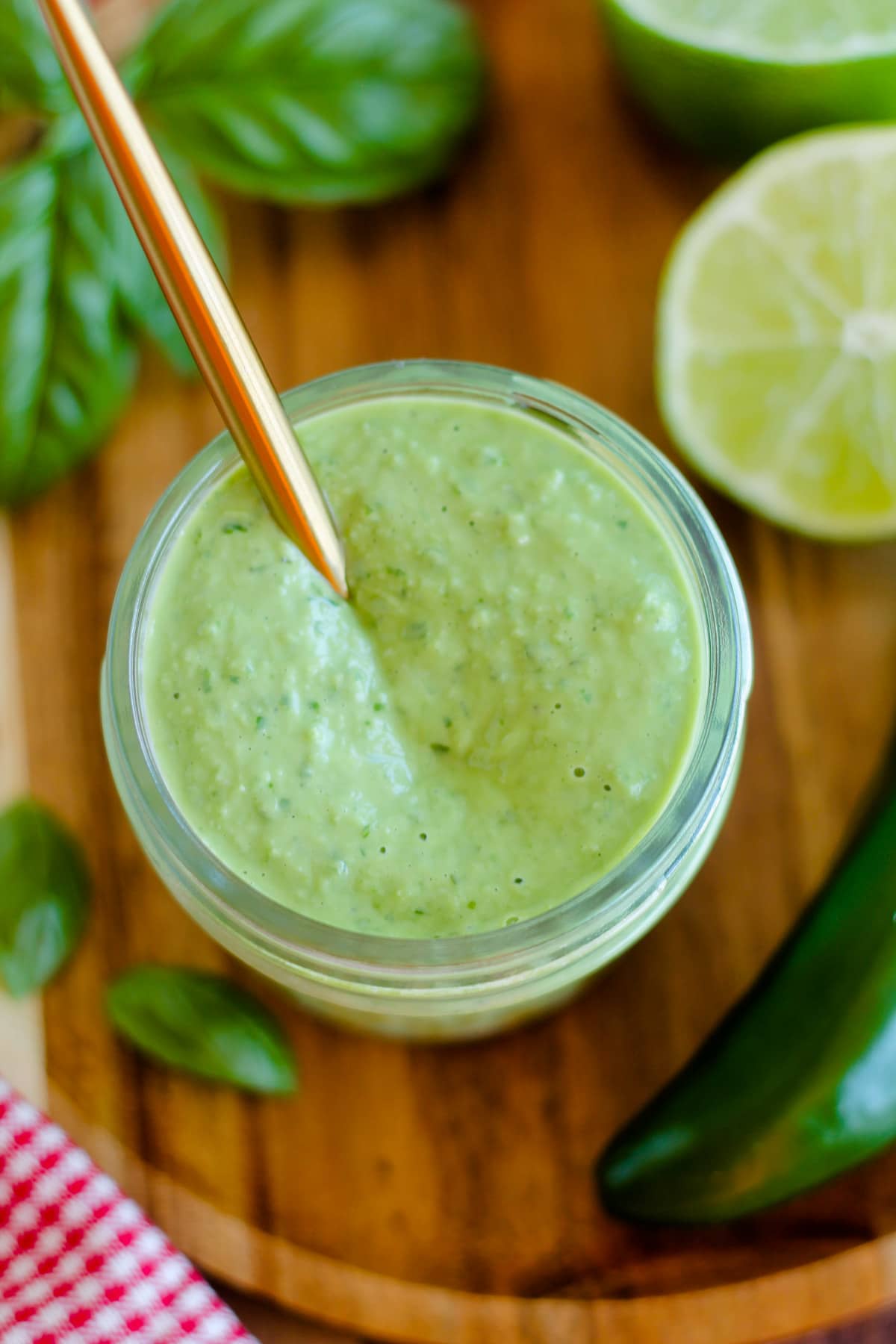 A jar of spicy basil sauce.