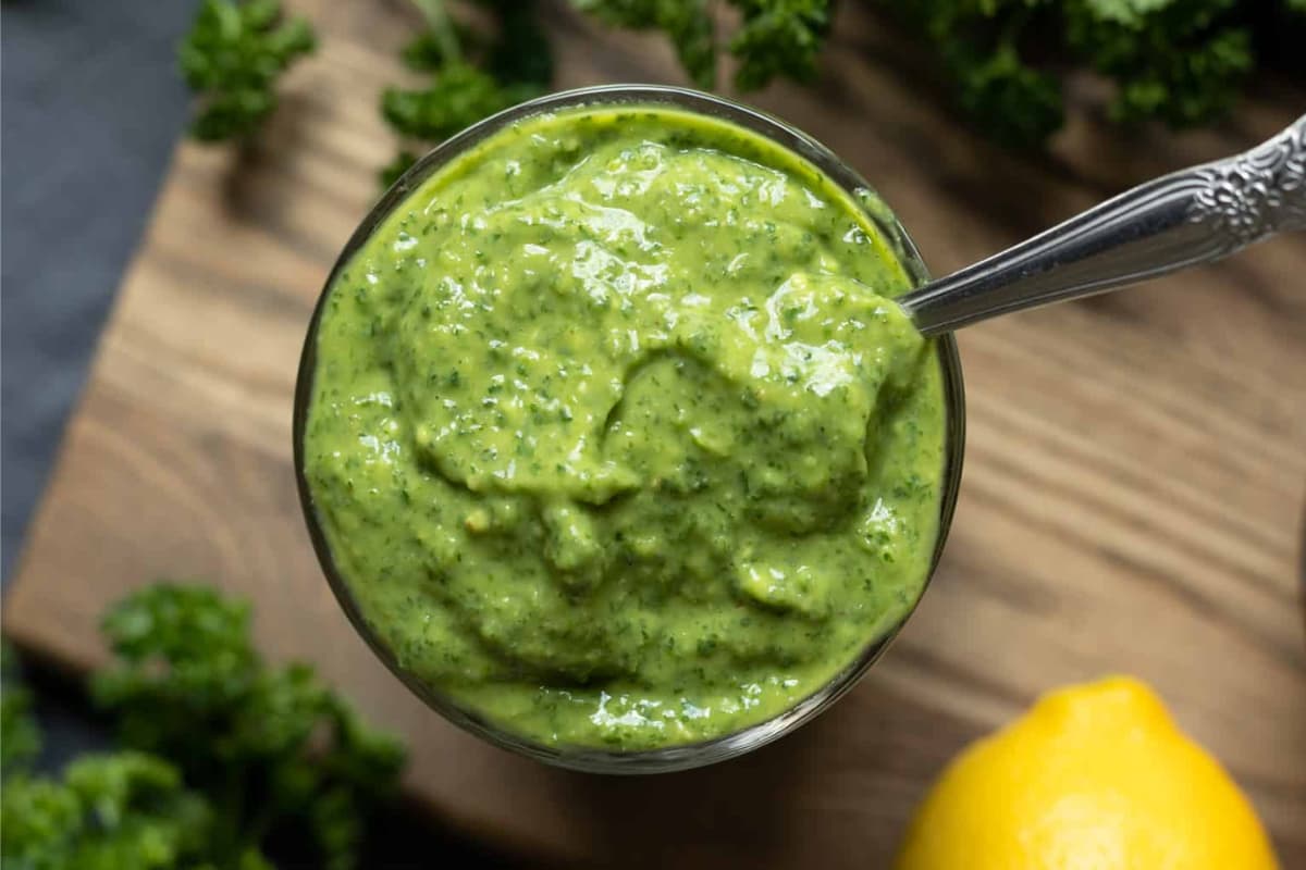 A jar of Avocado Green Goddess Dressing.