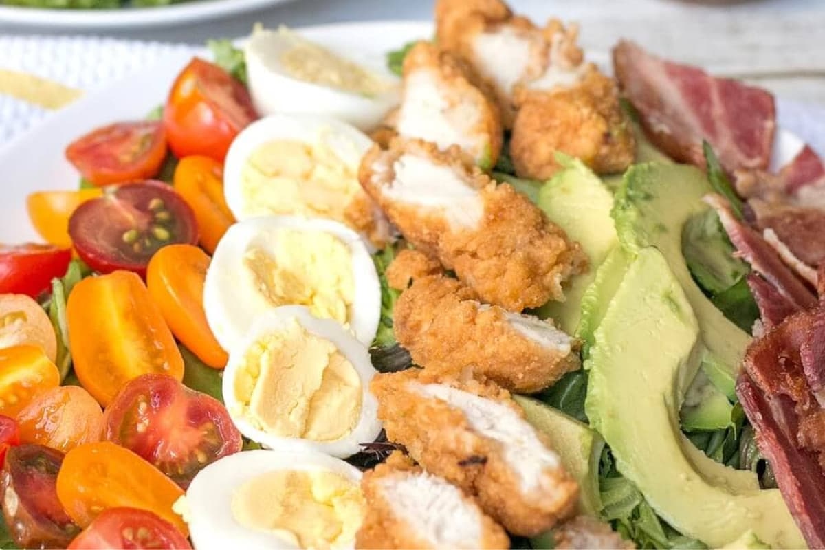 A plate of Crispy Chicken Cobb Salad.