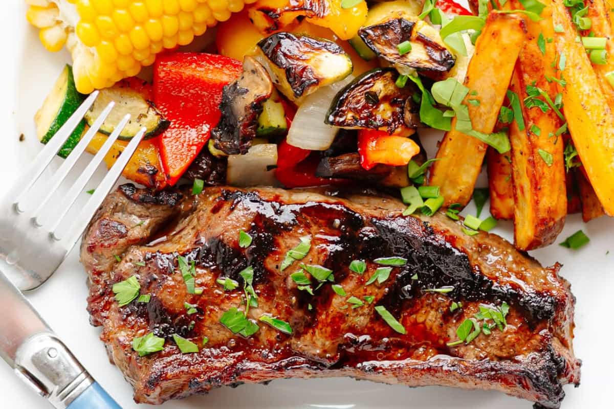 A plate of Grilled Marinated Steaks.