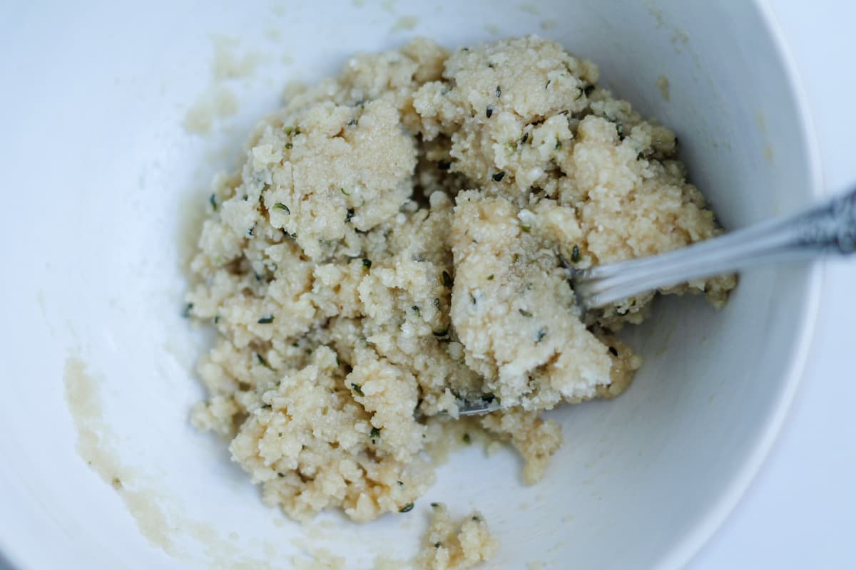 Ingredients being mixed in a bowl.