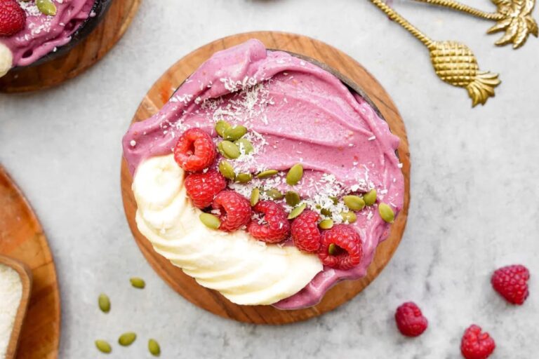 A bowl of High-Protein Raspberry Smoothie Bowl.